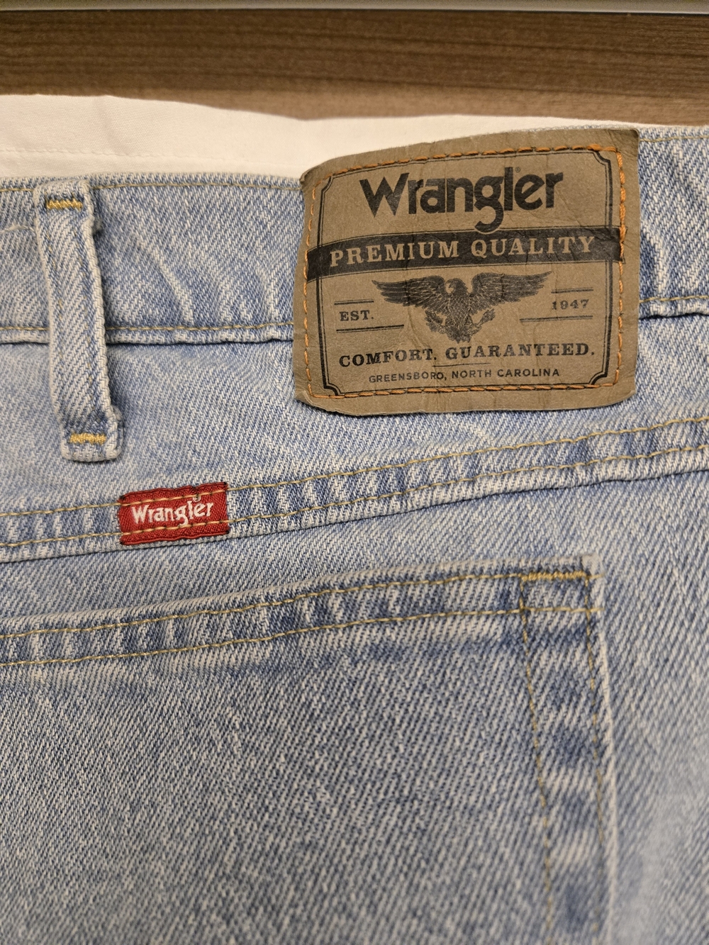 Wrangler Men’s Light Blue Denim Jeans with Red Logo Tab